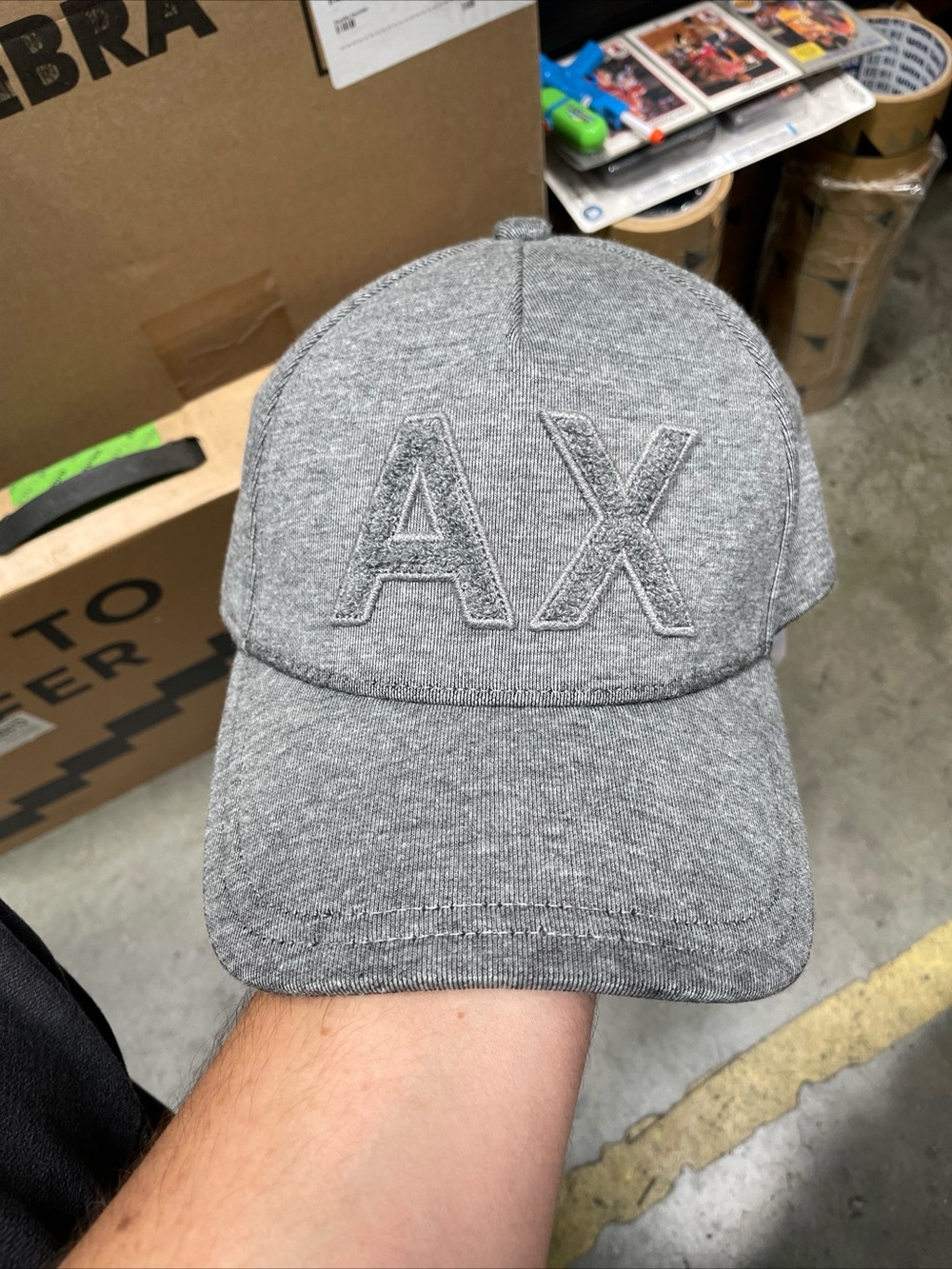 Armani Exchange AX Men’s Raised Logo Leather Strapback Hat Cap